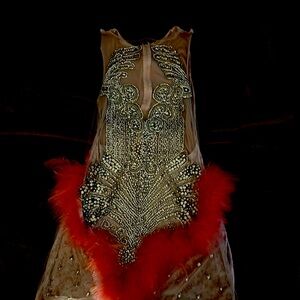 The material is stretchy. Can fit M-XL